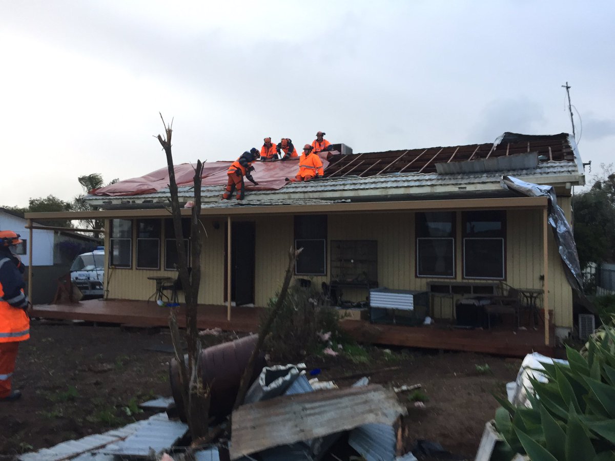 SES workers fixing a roof from a property in Blyth after a Tornado struck. Image Credit: Tornado damage on a farm in Melrose. Image Credit: Tom Fedorowytsch