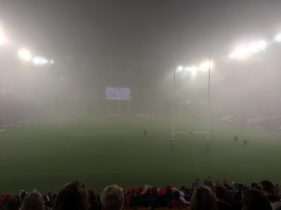 The Reds game was near impossible to watch as the cloud engulfed Suncorp. Image via James Caughlin