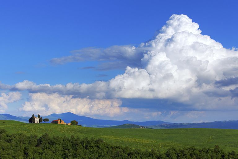 Cumulus clouds developing into thunderstorms. Image via Zelei / Getty Images 