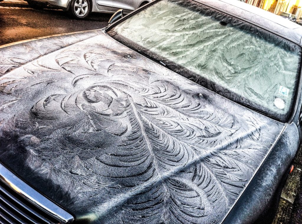 Window Frost on a car via Paul Williams who states dirtier cars get better frost feathers
